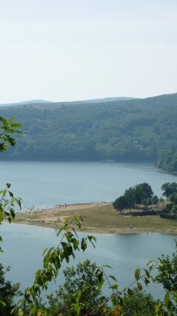 Swimming, surfing, sailing, pedal boating, fishing ... or just paddling in Lake Laouzas. reservoir Lac du Laouzas